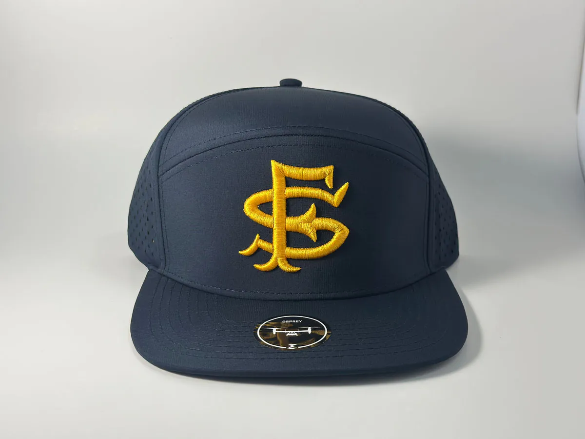 Navy seven-panel cap with a gold San Francisco monogram